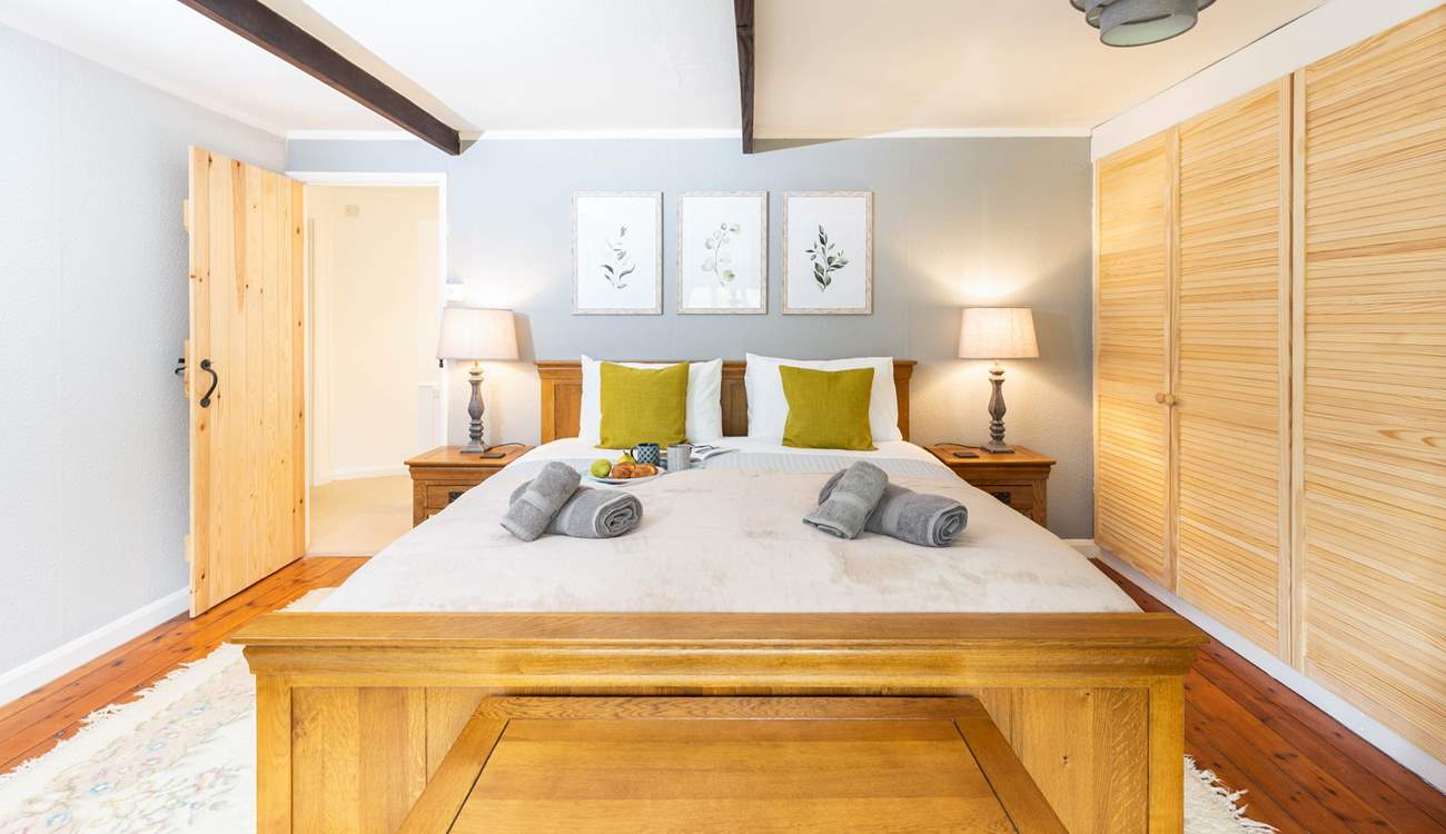 The beautiful super-king size bed in bedroom 1.