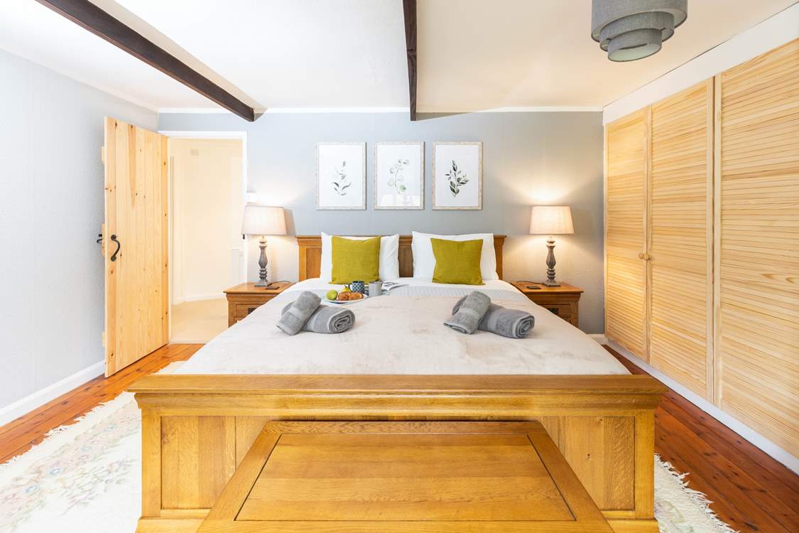 The beautiful super-king size bed in bedroom 1.