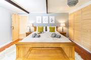 The beautiful super-king size bed in bedroom 1.