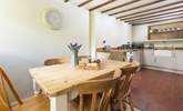 Step into the kitchen and dining area. - Thumbnail Image