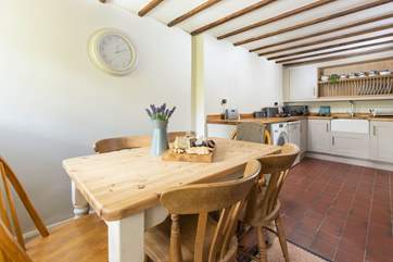 Step into the kitchen and dining area.