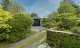 From your doorstep, looking over to the garage and the access to the garden. - Thumbnail Image