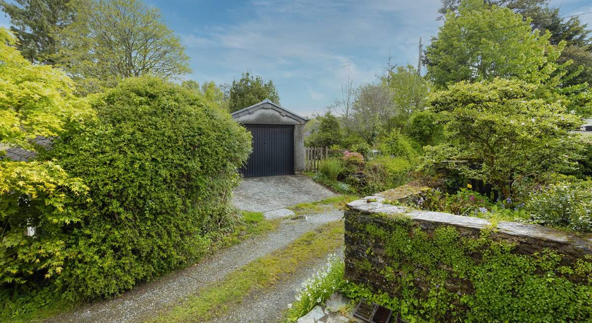 From your doorstep, looking over to the garage and the access to the garden.