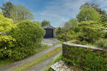 From your doorstep, looking over to the garage and the access to the garden.