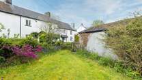 Looking back at the cottage from your private garden.