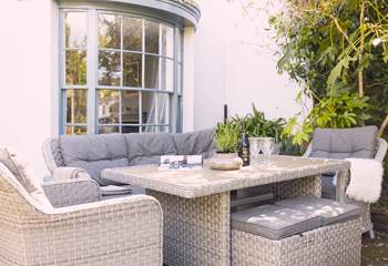 Relax in the pretty front garden.