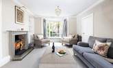 Beautifully furnished, the elegant sitting-room awaits. - Thumbnail Image