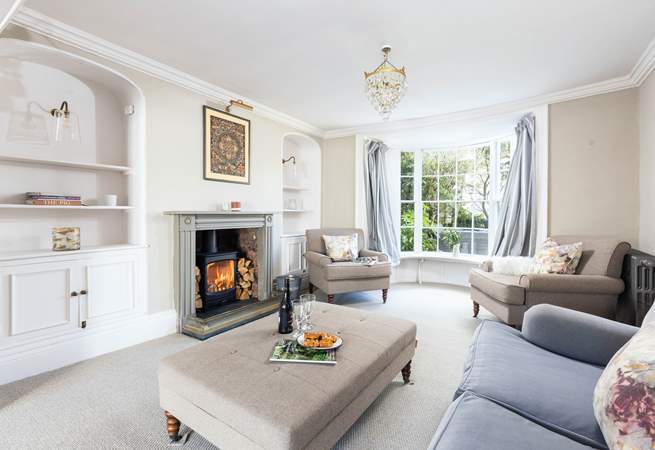 Decorated in relaxing pastel shades, the sitting-room is heavenly.