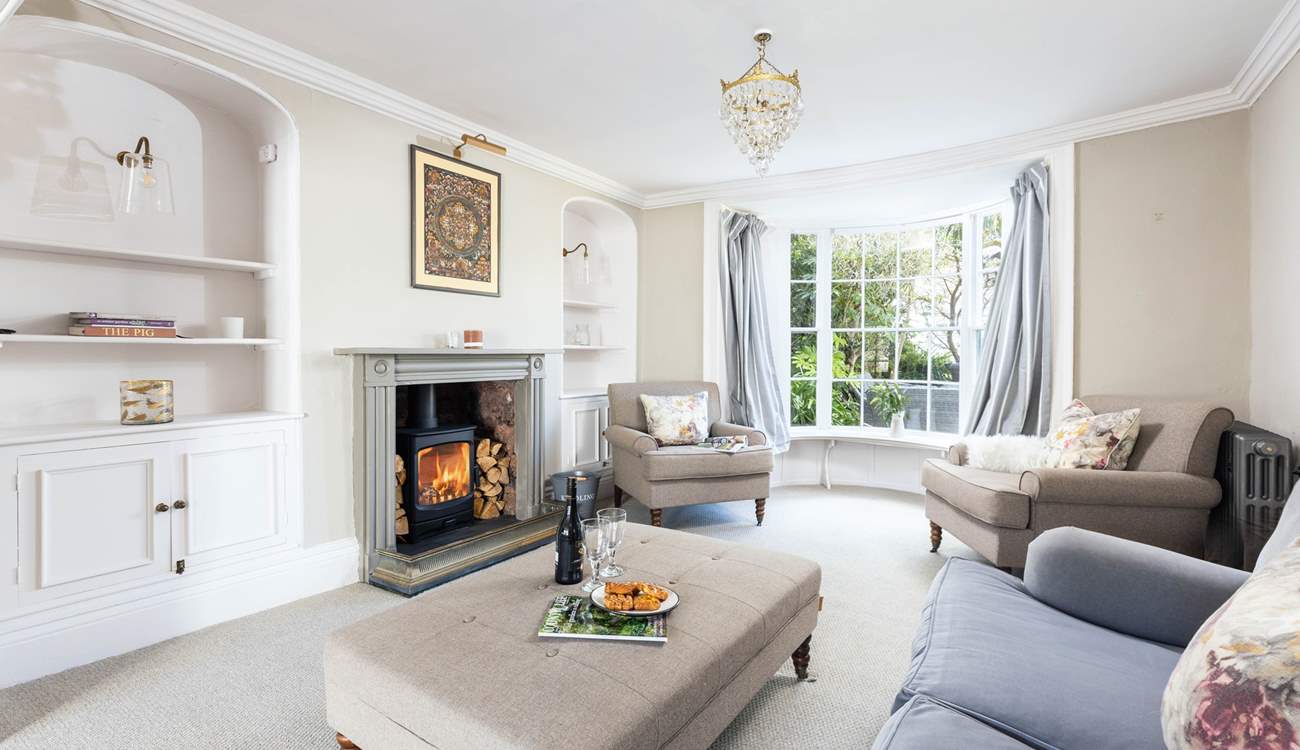 Decorated in relaxing pastel shades, the sitting-room is heavenly.