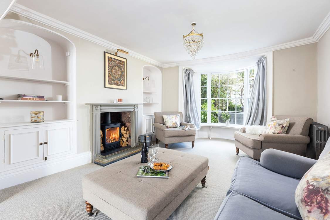 Decorated in relaxing pastel shades, the sitting-room is heavenly.
