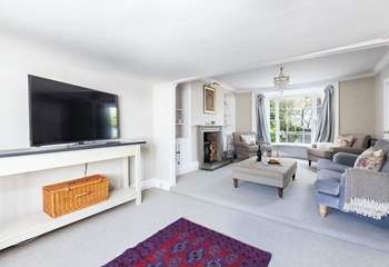 The main sitting-room offers oodles of space and comfort. The perfect place to gather together in the evening.