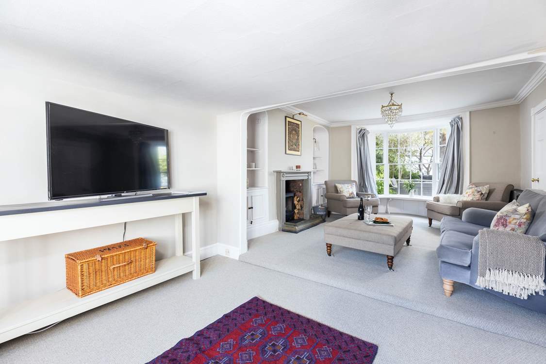 The main sitting-room offers oodles of space and comfort. The perfect place to gather together in the evening.