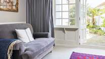 The patio doors lead out into the quiet back garden so you can let the outside in.