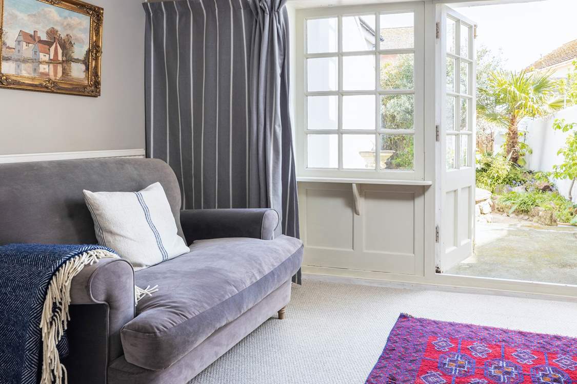 The patio doors lead out into the quiet back garden so you can let the outside in.