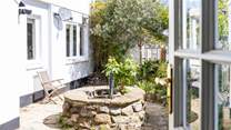 With access from the kitchen/diner, the terrace is a lovely sheltered place to sit in the sun and enjoy a morning coffee.