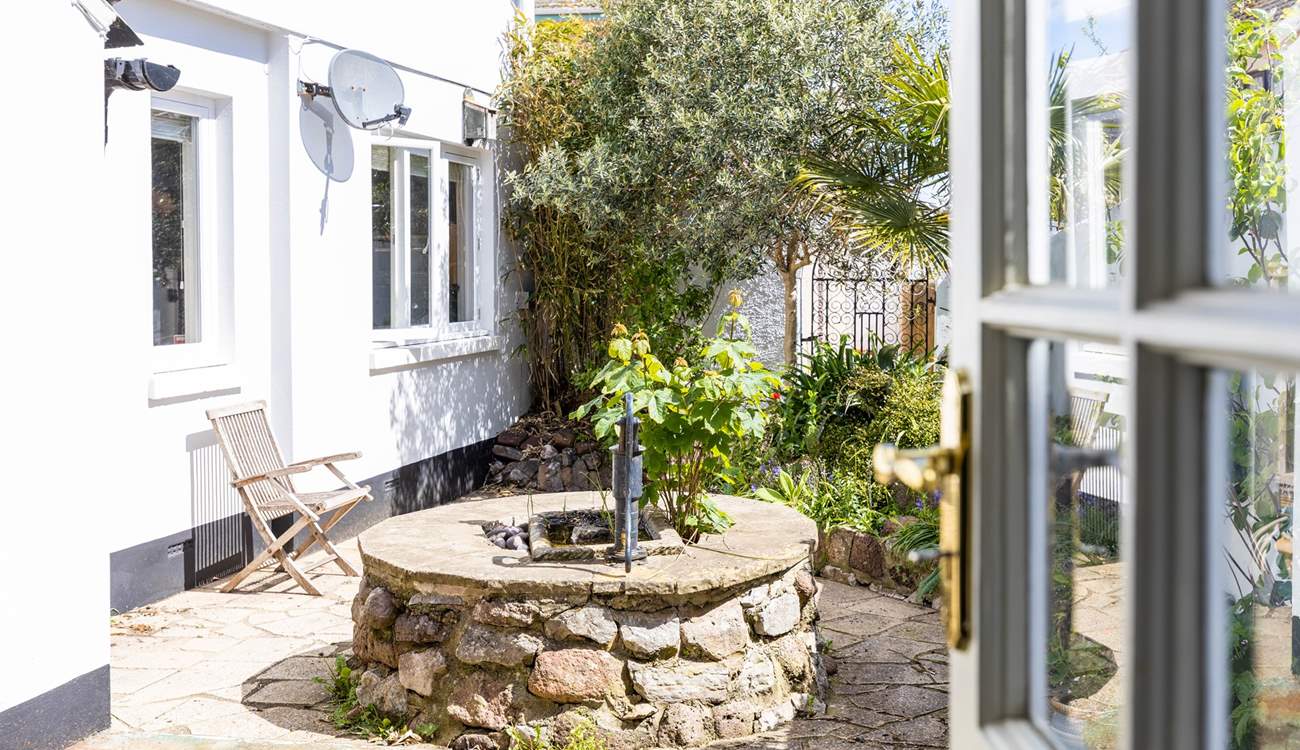 With access from the kitchen/diner, the terrace is a lovely sheltered place to sit in the sun and enjoy a morning coffee.