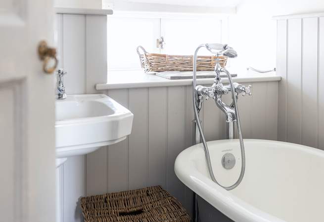 There is a useful hand shower attachment over the roll-top bath.