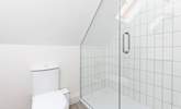 The family shower-room is home to this large walk-in shower, which is perfect after a day on the beach. - Thumbnail Image