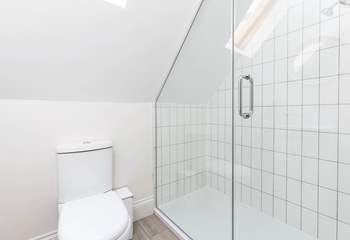 The family shower-room is home to this large walk-in shower, which is perfect after a day on the beach.
