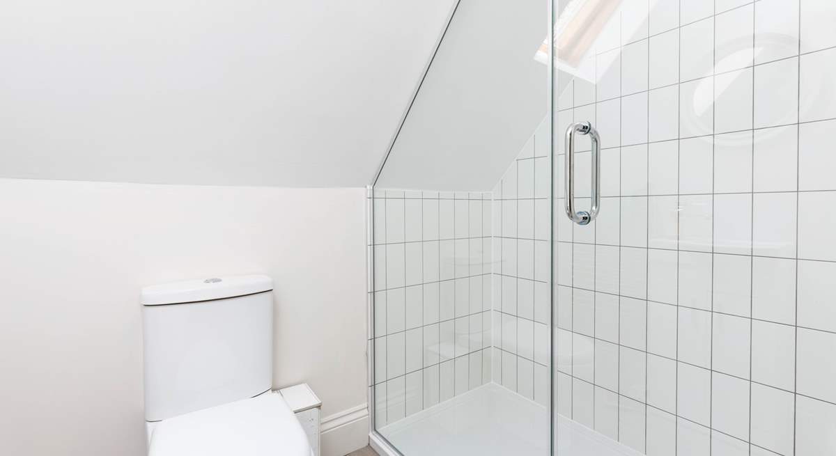 The family shower-room is home to this large walk-in shower, which is perfect after a day on the beach.