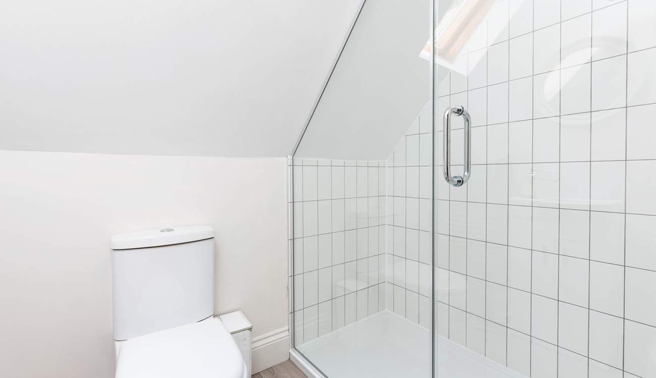 The family shower-room is home to this large walk-in shower, which is perfect after a day on the beach.