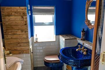 Lovely features can be found throughout the cottage, even in the bathroom.