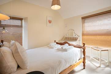 The double bedroom is a light and calming space.