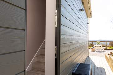 Take the stairs up to your lovely accommodation, your private garden is just in front.