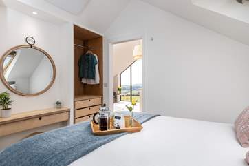 The bedrooms open onto the open plan living space.