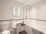 The family bathroom sits between bedrooms 1 and 2.