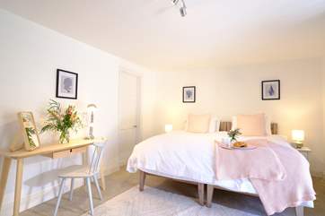 The pretty main bedroom can be a twin or double bedroom.