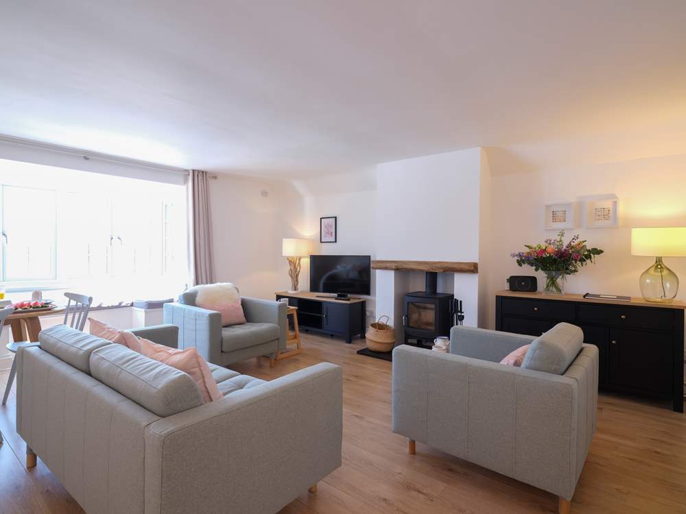 Relax in the pastel shades of the living-room.