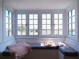 Sit back and enjoy the wonderful window seat in the living-room.