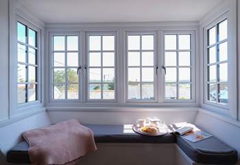 Sit back and enjoy the wonderful window seat in the living-room.