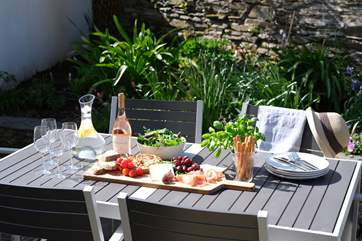 The secluded patio is the perfect place for outside dining.