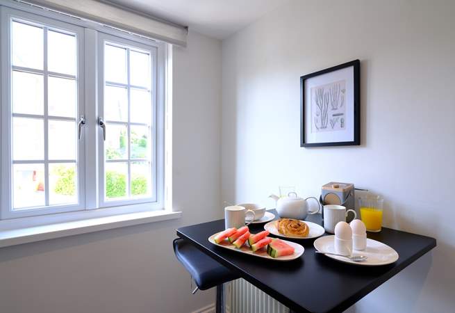 A breakfast-bar for two in the kitchen, perfect for a cosy chat.