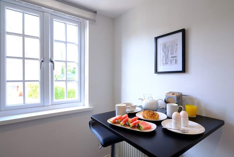 A breakfast-bar for two in the kitchen, perfect for a cosy chat.