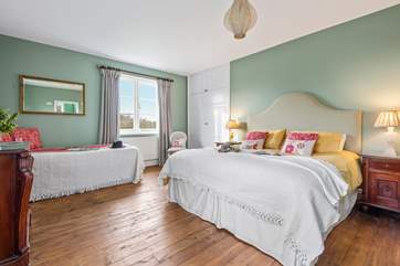 Super spacious bedroom one with an additional single bed.