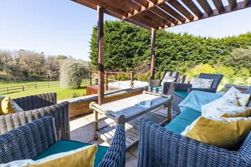 Enjoy the sunshine on the veranda or from the hot tub!
