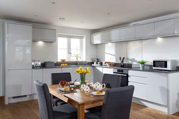 The open plan dining area is light and bright.