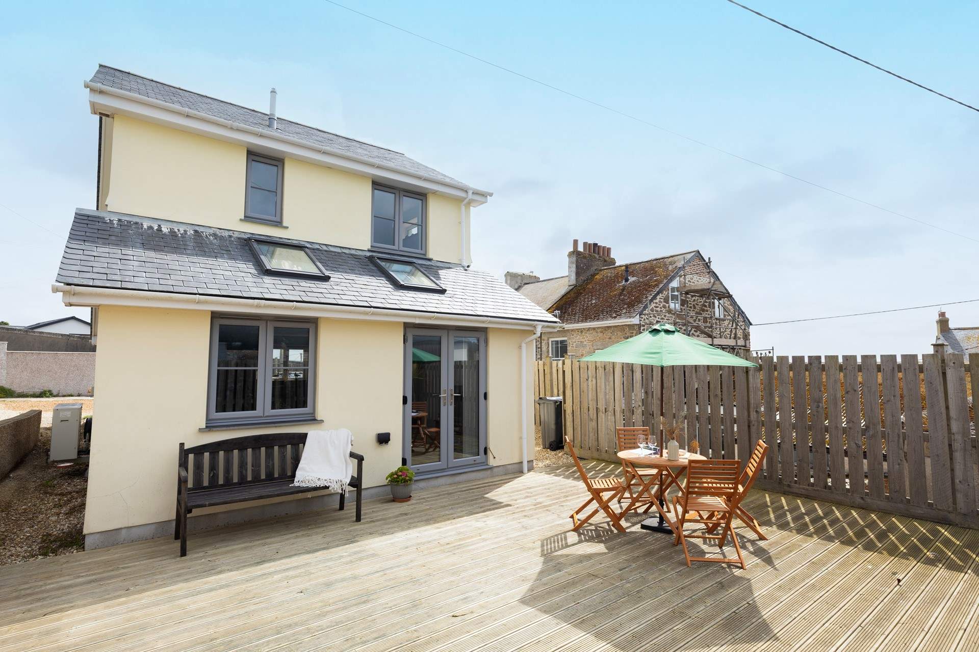 Relax on the decking and soak up the sunshine.