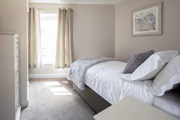Bedroom 2 offers this super inviting single bed.