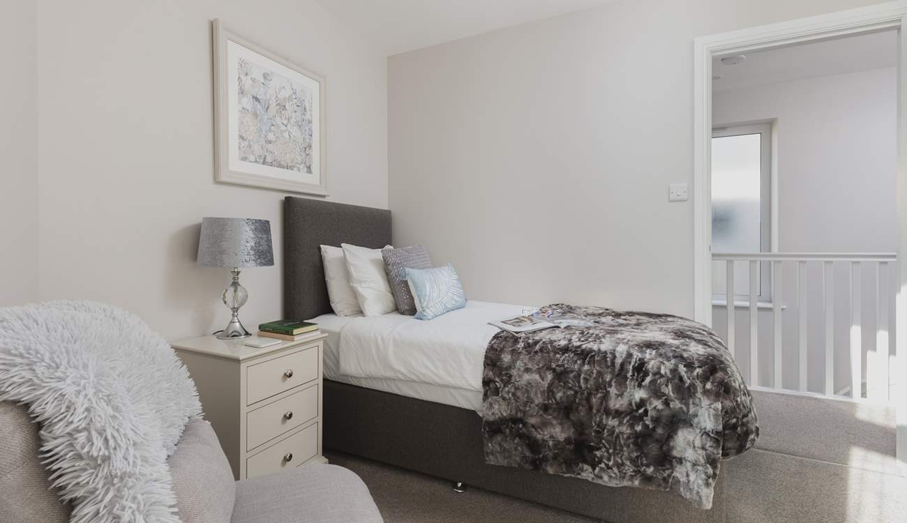 Bedroom 2 offers this super inviting single bed.