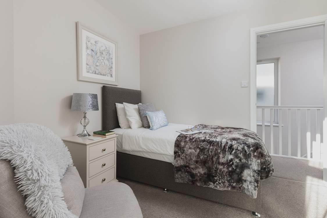 Bedroom 2 offers this super inviting single bed.