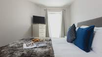Bedroom 1 also offers a TV, the perfect addition for those lazy mornings or early nights.