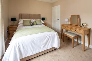 Bedroom 1 on the first floor is super inviting.