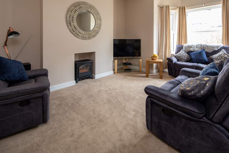 Snug living area with electric fire for those chillier evenings in.