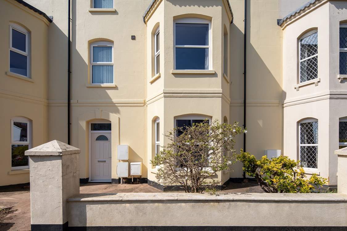 Magnolia is a proud terraced townhouse situated moments from the beach.