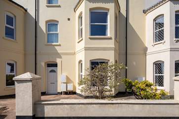 Magnolia is a proud terraced townhouse situated moments from the beach.
