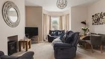 The sitting/dining-room with an electric fire for those chillier evenings in.